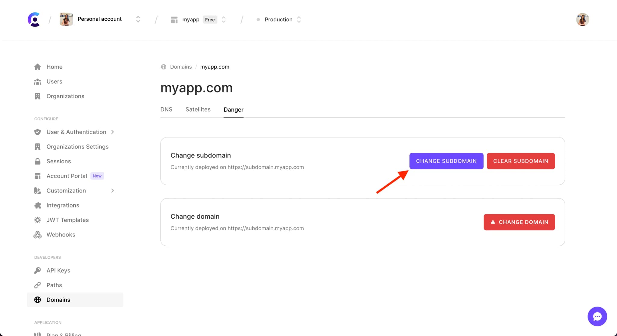 The 'Danger' tab of the Domains page in the Clerk Dashboard.There is a red arrow pointing to the 'Change subdomain' button.